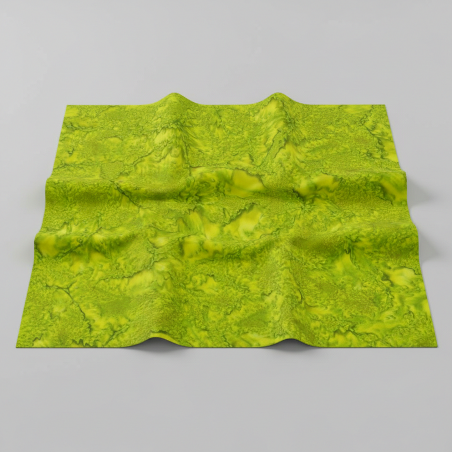 Expressions Batiks Hand-Dyed Sap quilting cotton draped over a flat surface with soft folds to show softness and movement