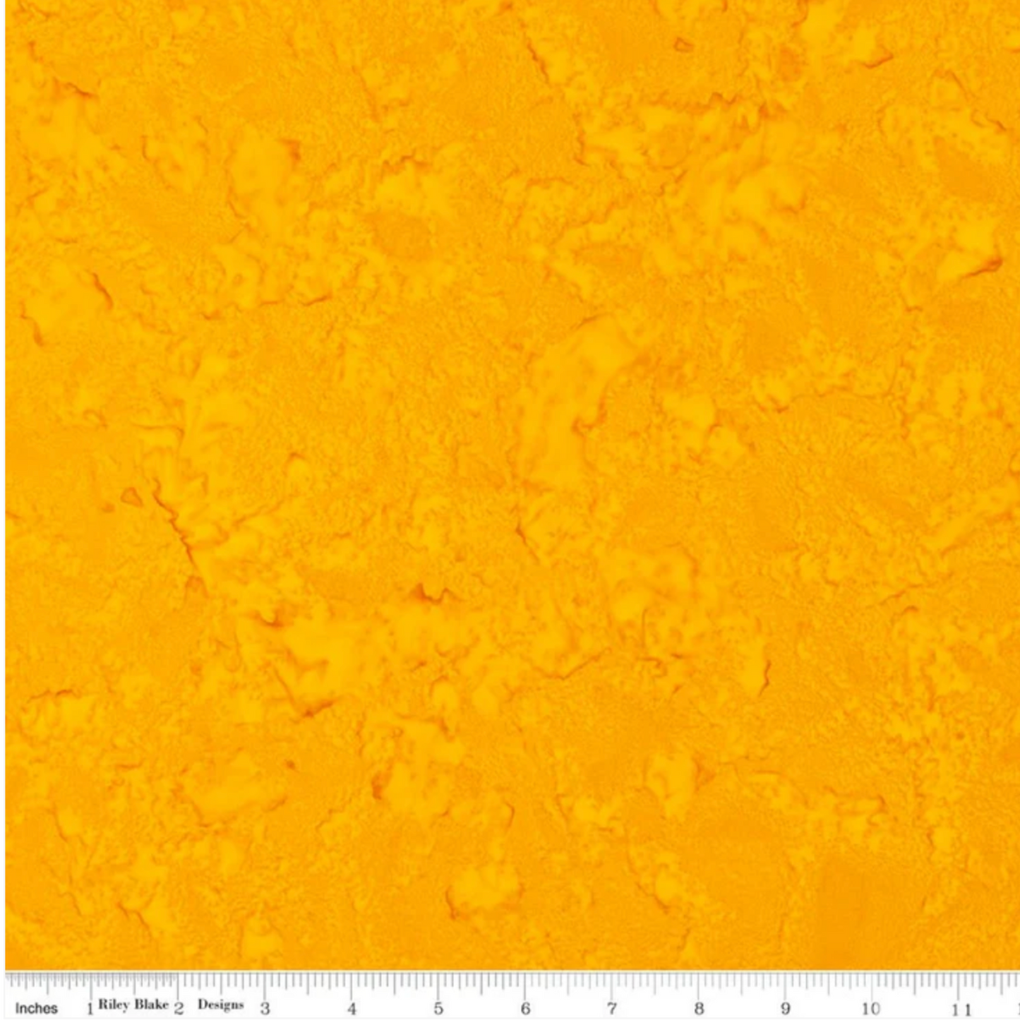 Expressions Batiks Hand-Dyes quilting cotton with ruler showing scale of pattern repeat – Curry rich golden yellow hand-dyed batik