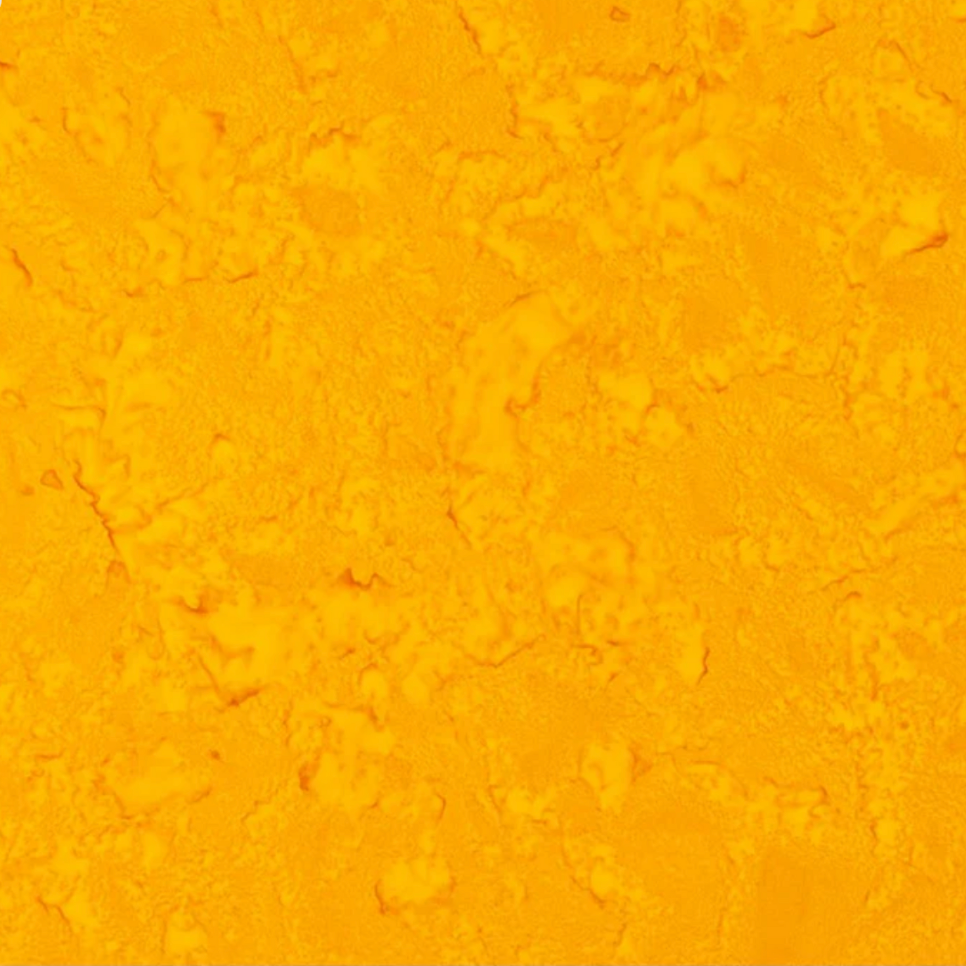 Close-up detail of Expressions Batiks Hand-Dyes Curry quilting cotton fabric highlighting print clarity and rich curry yellow hand-dyed batik texture