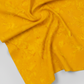 Expressions Batiks Hand-Dyed Curry quilting cotton fabric by Riley Blake Designs – rich golden curry yellow hand-dyed batik in soft folds on flat surface showing texture and tonal variation