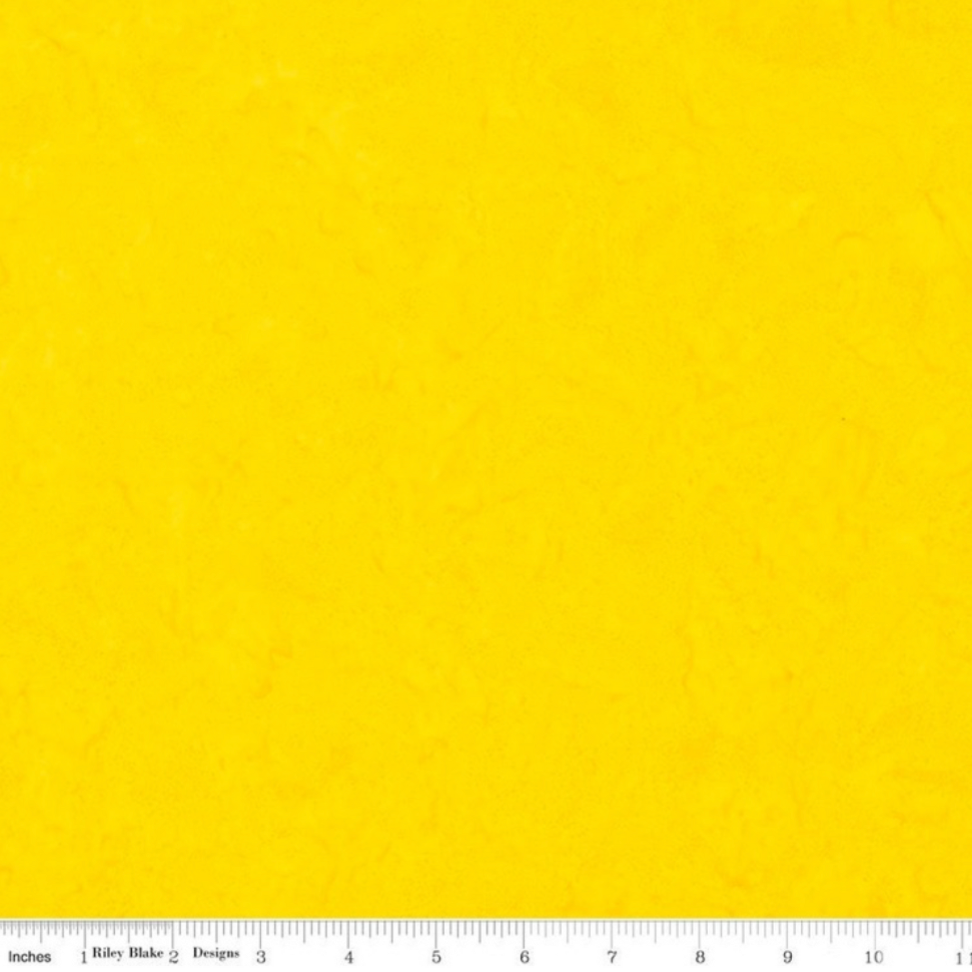 Expressions Batiks Hand-Dyes quilting cotton with ruler showing scale of pattern repeat – Bumblebee bright sunny mid-yellow hand-dyed batik