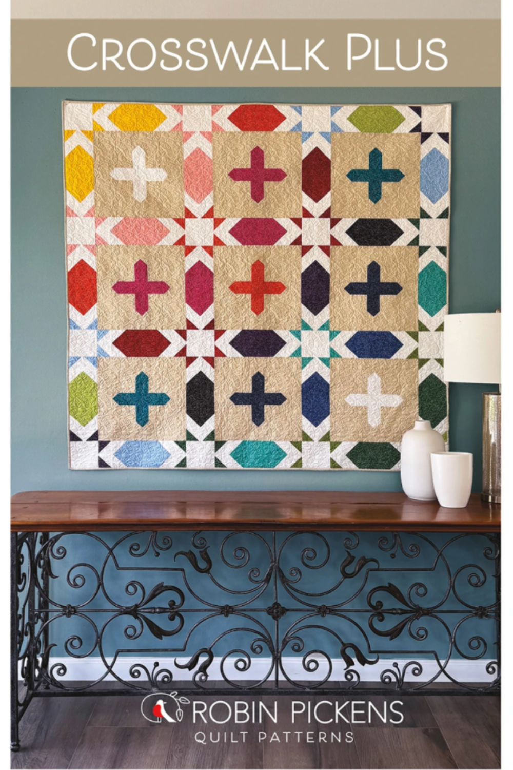 Bold plus blocks and open star elements make this modern lap quilt a showstopper! Crosswalk Plus by Robin Pickens is precut friendly — use a Dessert Roll or Layer Cake. Shop at IraRobi Quilts! #QuiltPattern #RobinPickens #ModernQuilt