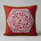 Finished kaleidoscope quilt pillow showcasing detailed geometric fabric design