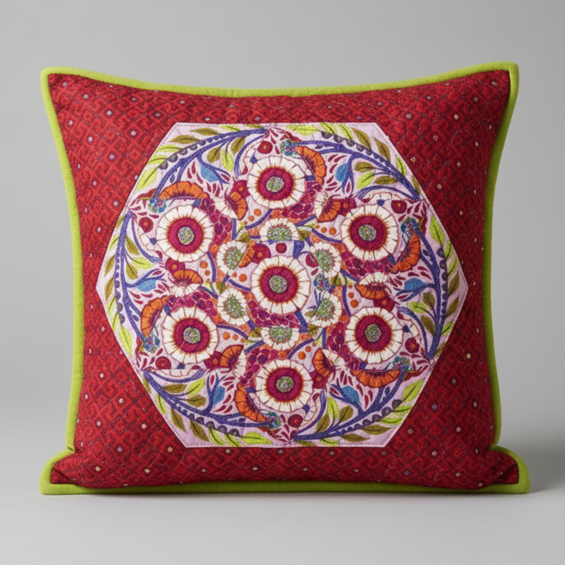 Finished kaleidoscope quilt pillow showcasing detailed geometric fabric design