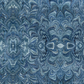 Carpet Bag Romance Blue Marble fabric by Jason Yenter for In The Beginning Fabrics with ruler showing print scale – intricate symmetrical marbled damask with kaleidoscopic feathered medallion in deep steel blue, slate, and navy with shimmering white highlights, 100% cotton, 3 yard cut