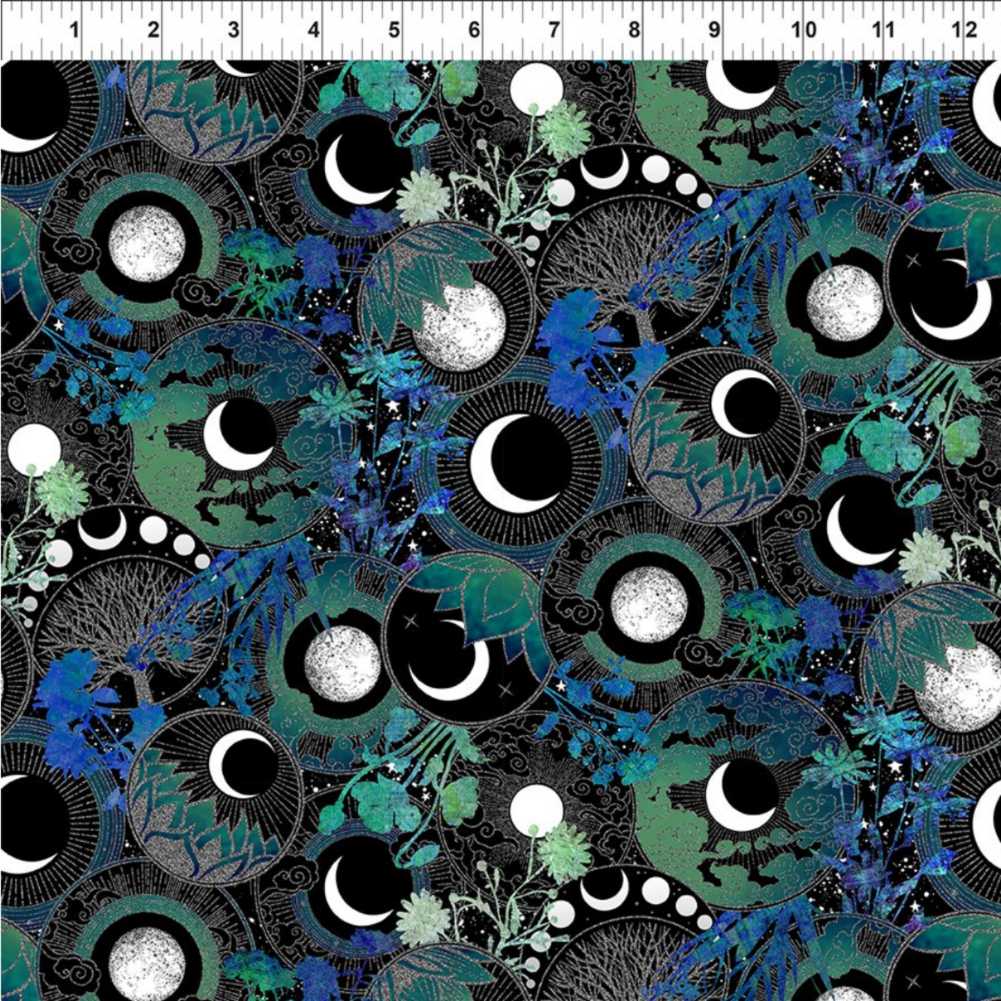 La Luna Blue Silver Moon Collage quilting cotton fabric with ruler showing print scale – dramatic moon phase medallions with silver radiating lines, crescent moons, and watercolor botanicals in teal, emerald, cobalt, and silver on deep black by Jason Yenter for In The Beginning Fabrics, 100% cotton, 3 yard cut