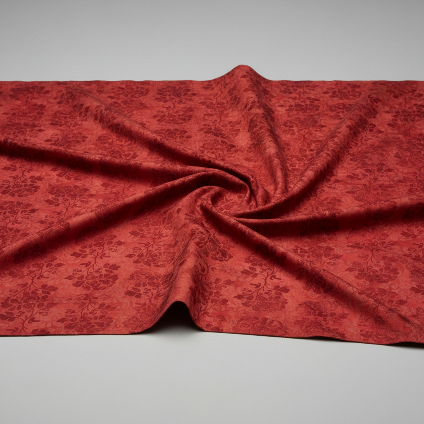 Prism Orange Rose fabric draped to show natural fall and movement of 100% cotton material