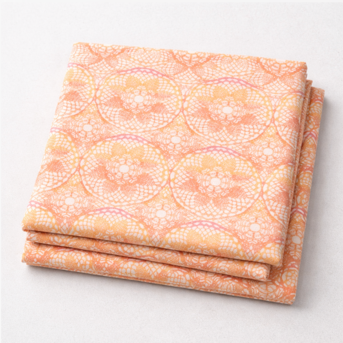 Patricia Coral Lace quilting cotton fabric close-up showing delicate coral lace pattern. 3 yard cut