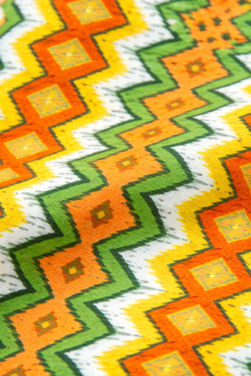 Jungle Friends Multi Stripe 3-yard cut fabric with orange, green, yellow, white, and gold geometric stripes.