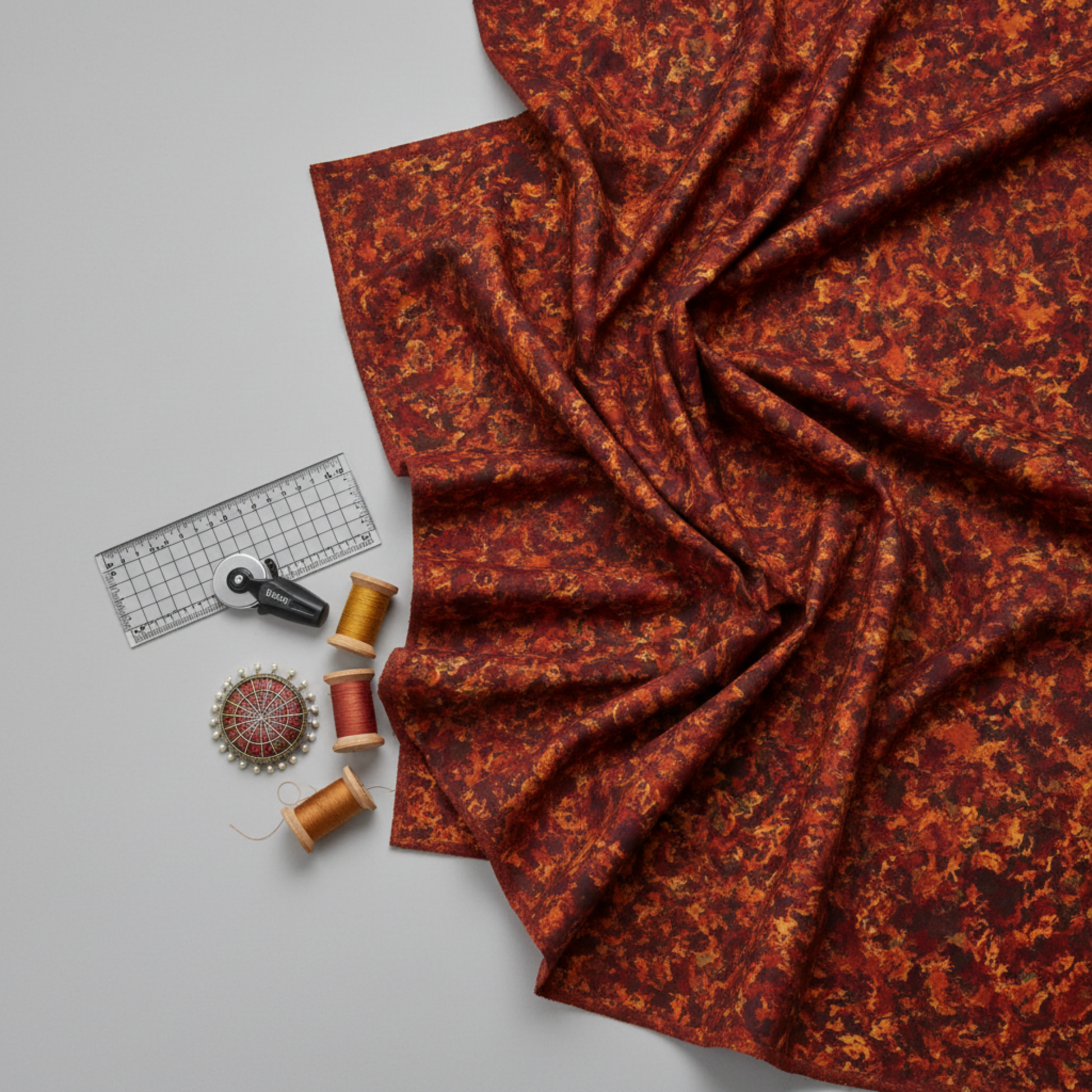 A Year of Art Autumn Texture 3 yard cut quilting fabric shown from alternate angle highlighting rich fall color blending