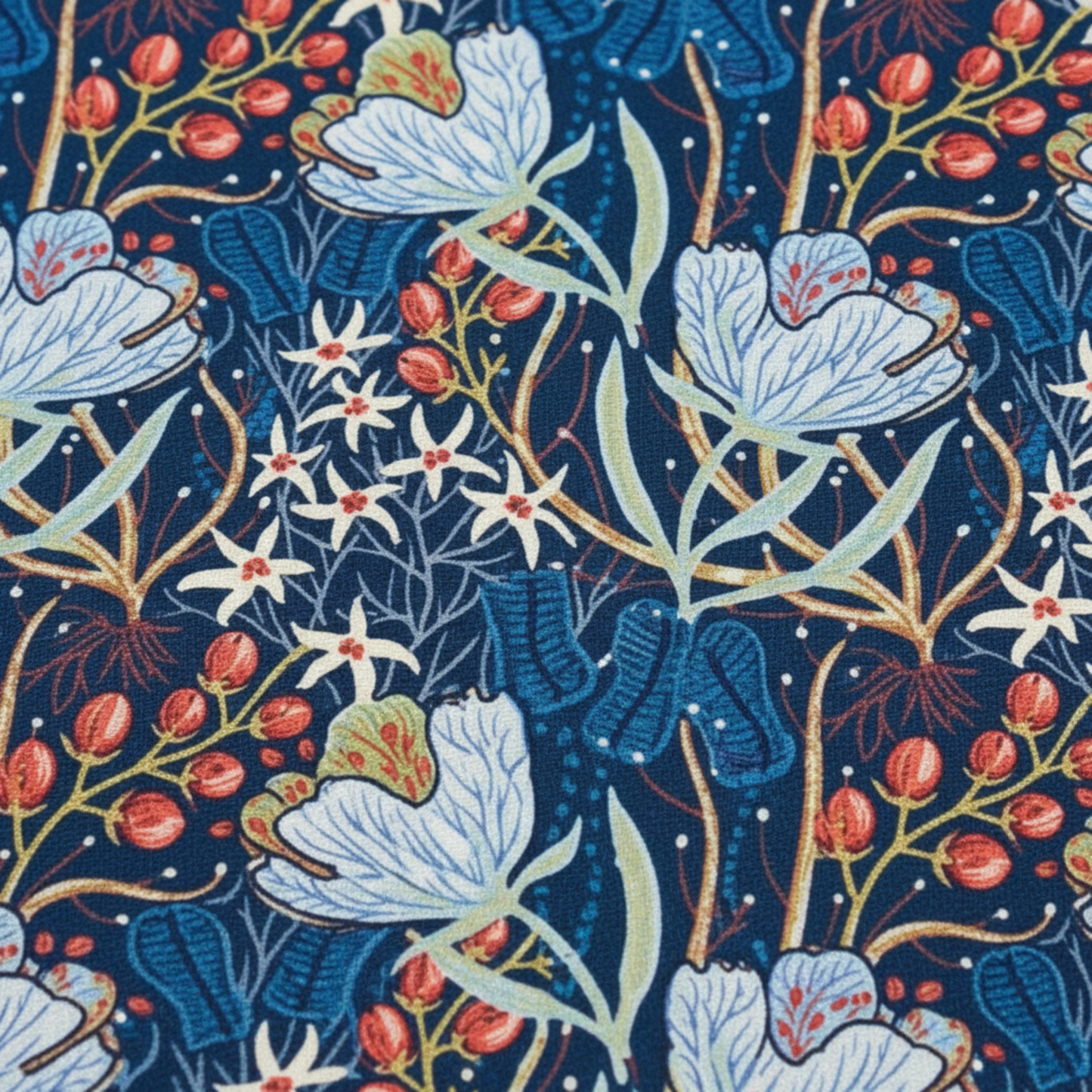 Close-up of Whimsy Anemones and Berry Pods Blue fabric showing delicate floral linework and soft blue tones