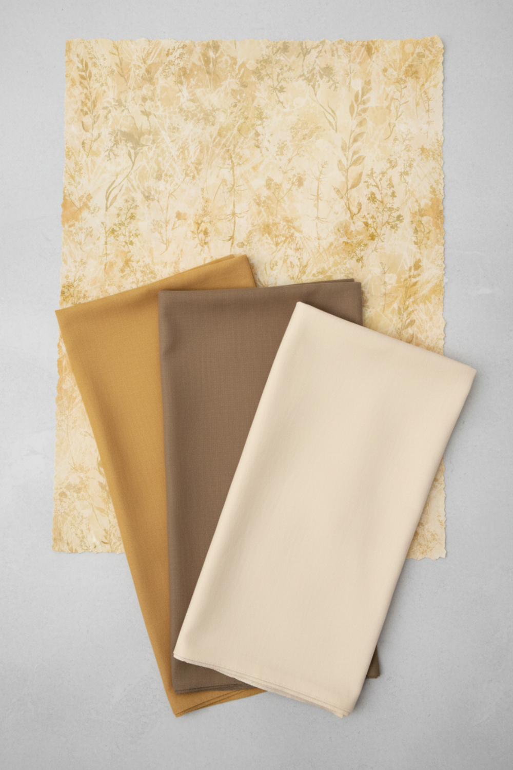 Reflections of Autumn II Twigs quilting cotton styled with coordinating autumn fabrics for quilt color planning and fall project inspiration