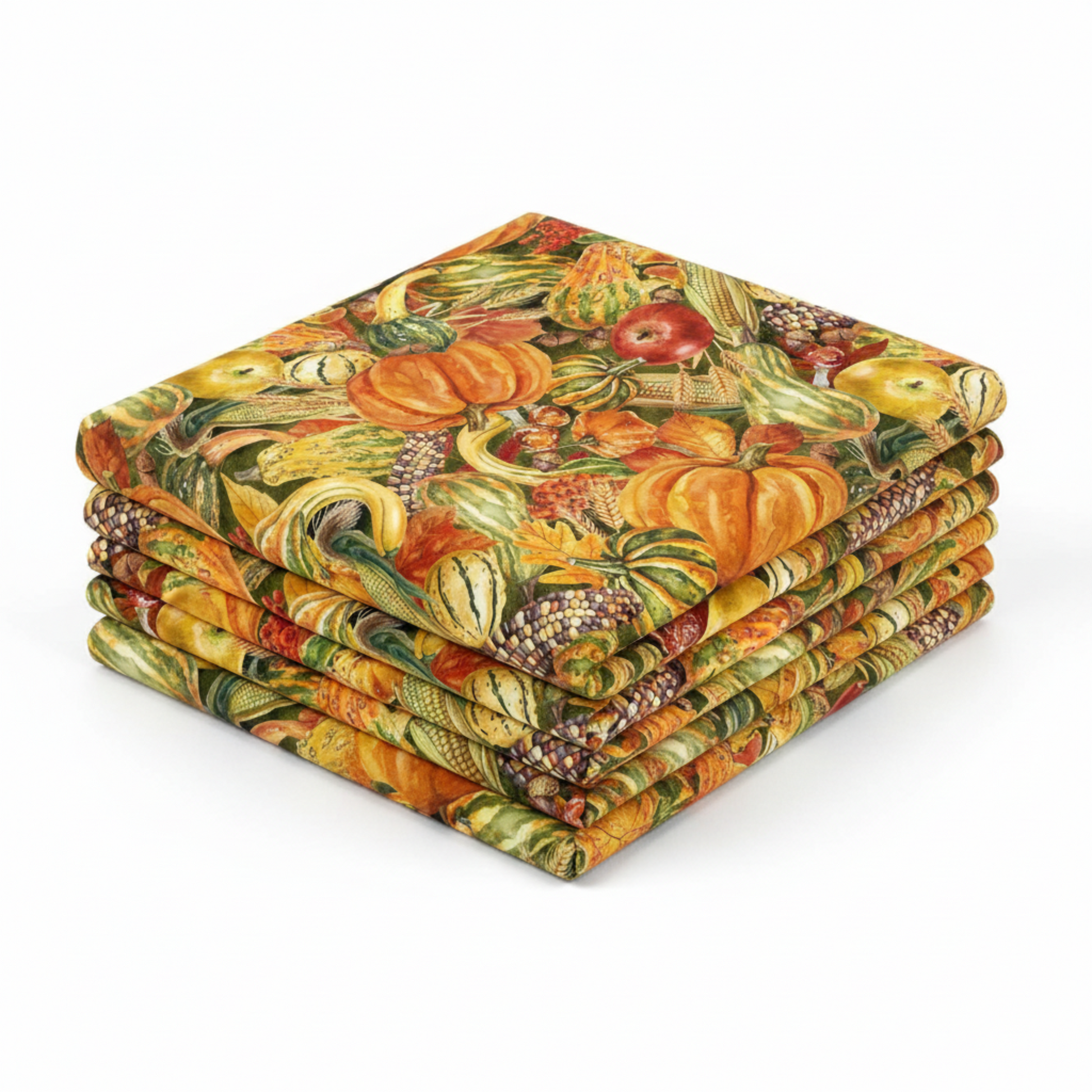 Autumn vegetable quilting fabric with pumpkins and berries in warm seasonal tones, shown from an angled view.
