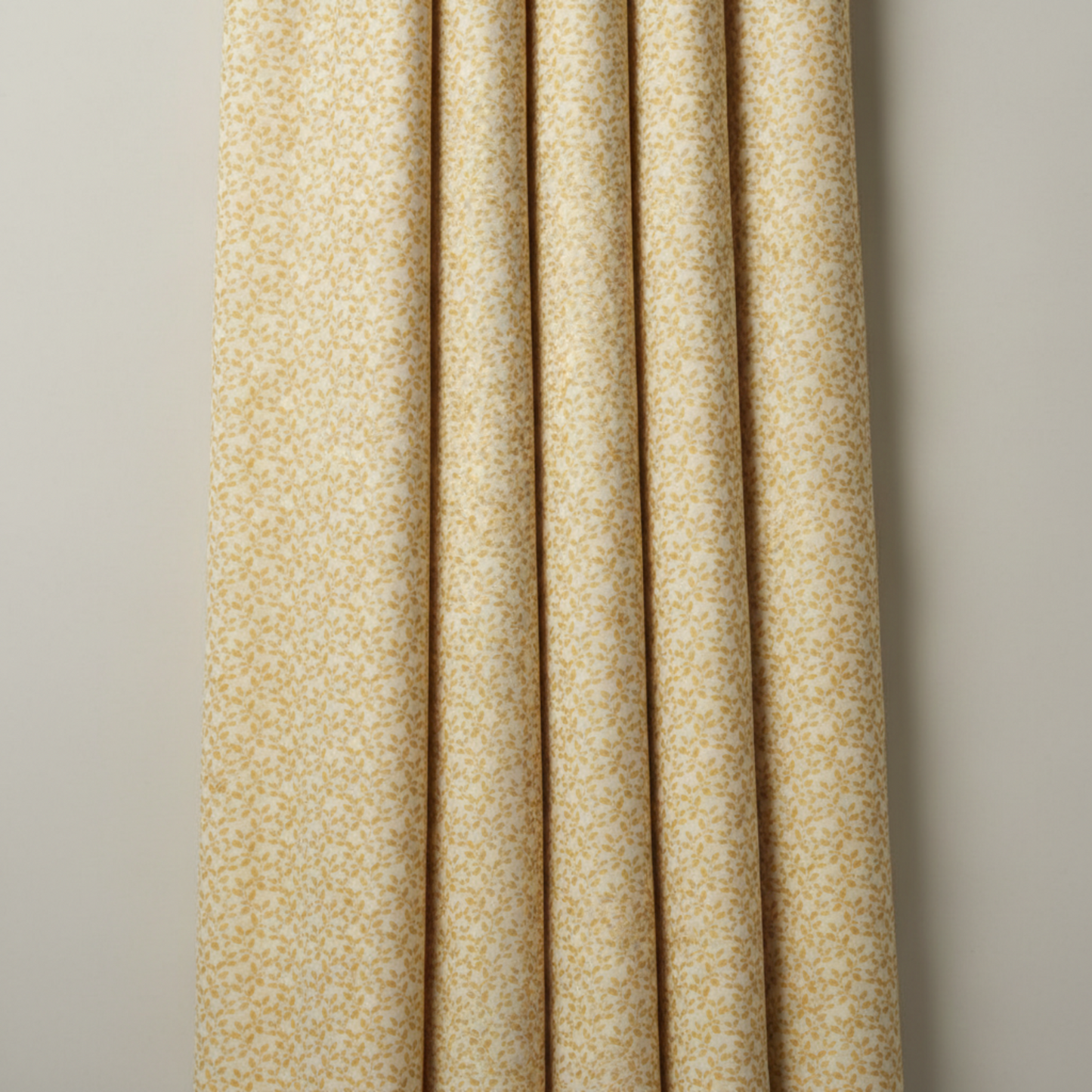 Repeating golden vine pattern on Autumn Celebration Gold Vines quilting cotton