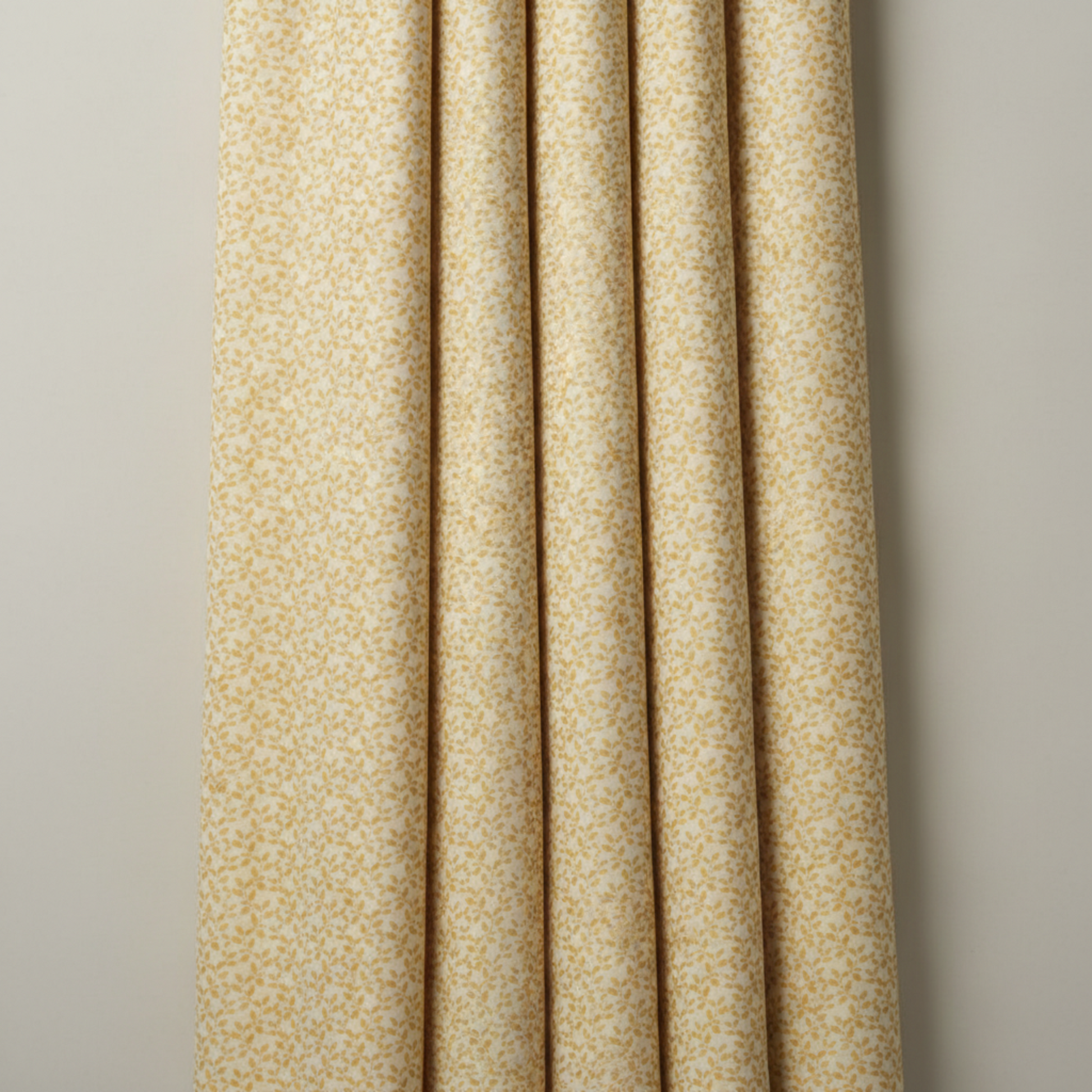 Repeating golden vine pattern on Autumn Celebration Gold Vines quilting cotton