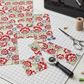 NYSNO Multicolor Floral quilting cotton fabric styled with quilting notions – winter holiday sewing inspiration