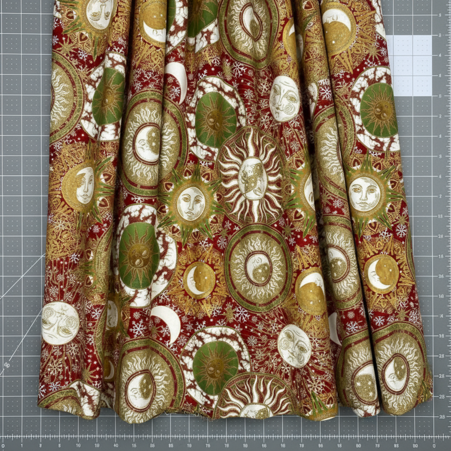 Detailed view of Winter Solstice II Multi Celestial Metallic cotton fabric highlighting elegant celestial and metallic design