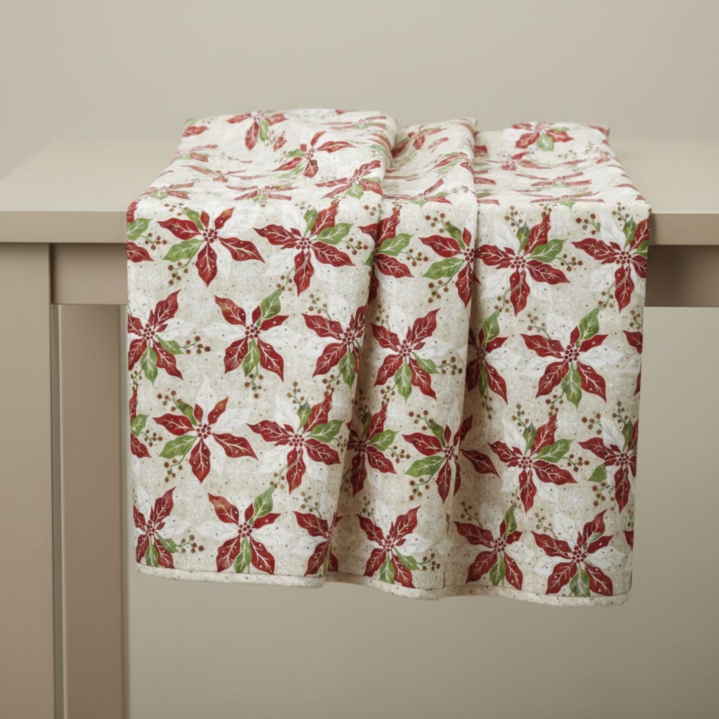 Winter Solstice II Cream Poinsettia Metallic quilting cotton draped to show softness and movement