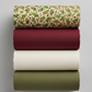 Winter Solstice II Beige Twigs Metallic quilting cotton styled in folded stack – lifestyle shot for quilters