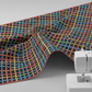 On the Go Plaid Multi quilting cotton fabric from the On The Go collection, multicolor plaid draped beside sewing machine to show soft drape and scale.