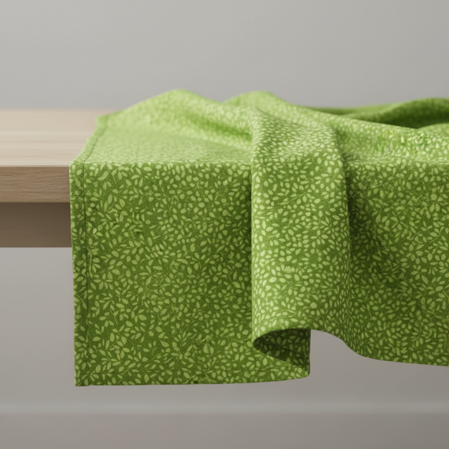 Full repeat view of On the Go Leaves Green quilting cotton showing fresh tonal green leaf pattern