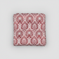 Close-up detail of Nature's Winter Red Snowflake Ogee quilting cotton fabric highlighting intricate snowflake medallions