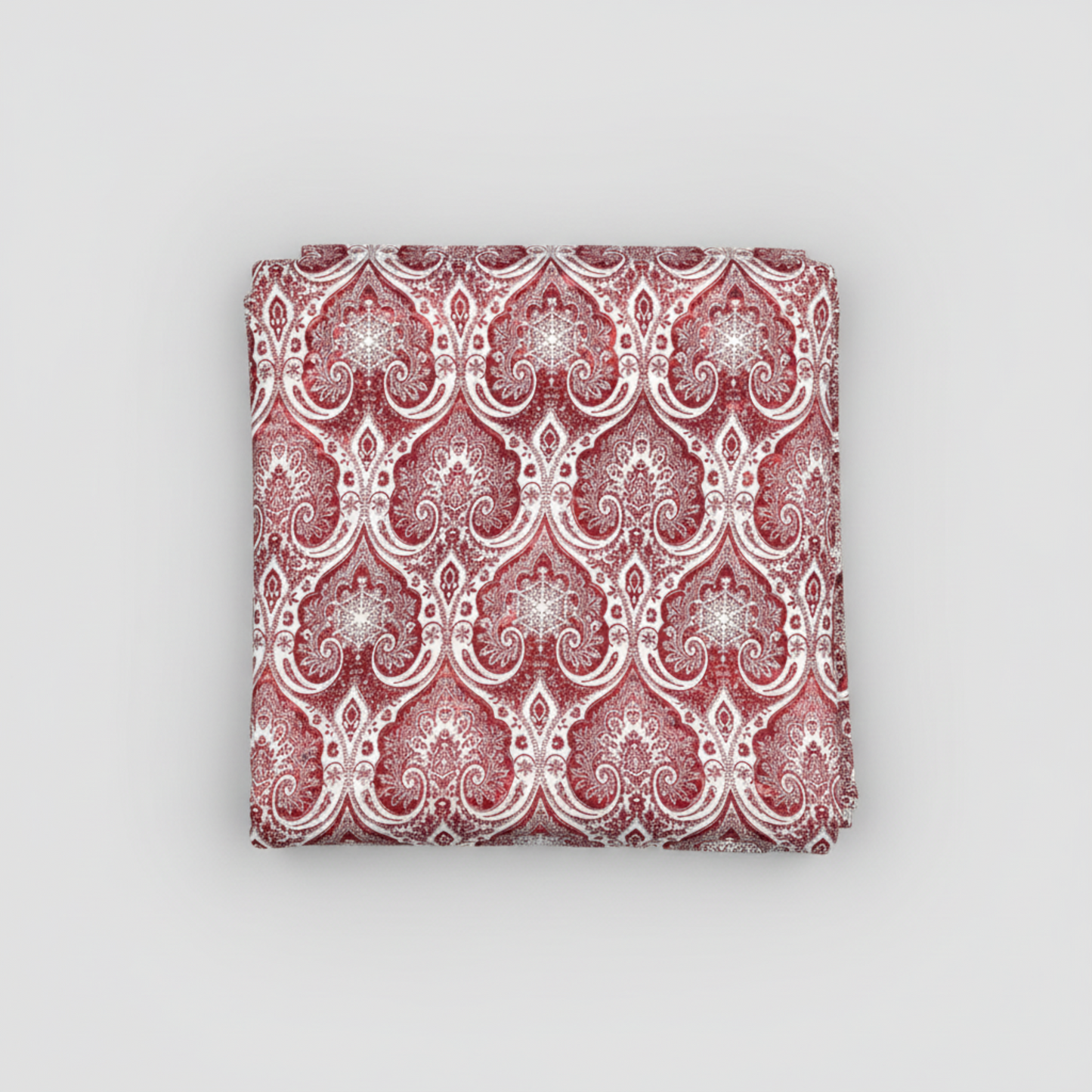Close-up detail of Nature's Winter Red Snowflake Ogee quilting cotton fabric highlighting intricate snowflake medallions