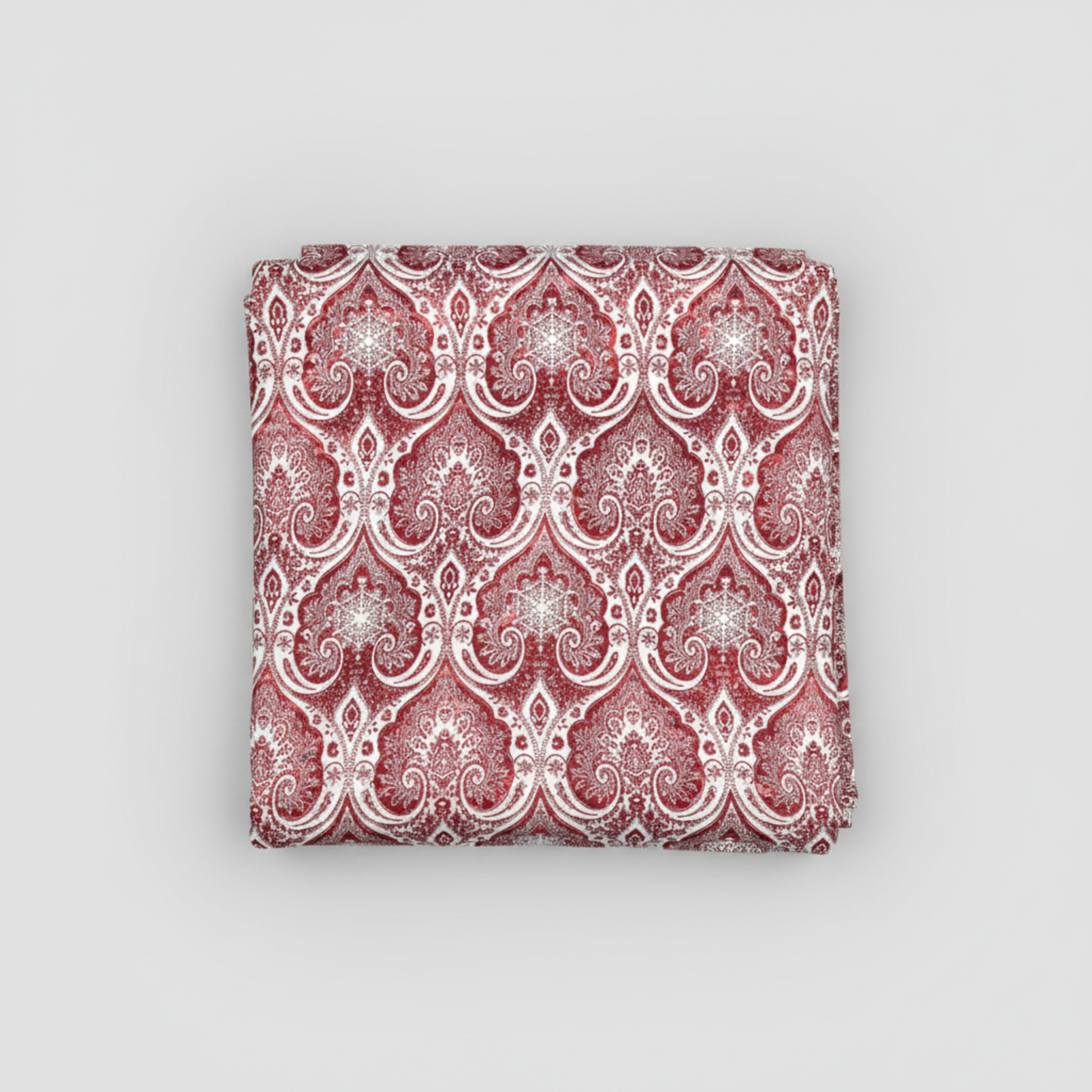 Close-up detail of Nature's Winter Red Snowflake Ogee quilting cotton fabric highlighting intricate snowflake medallions