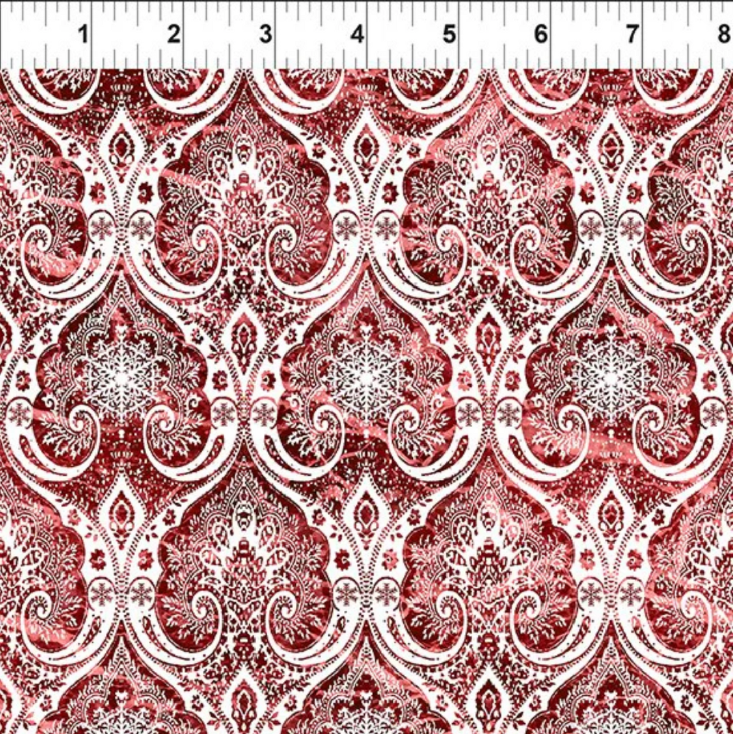 Nature's Winter Red Snowflake Ogee quilting cotton with ruler showing scale of snowflake ogee pattern repeat