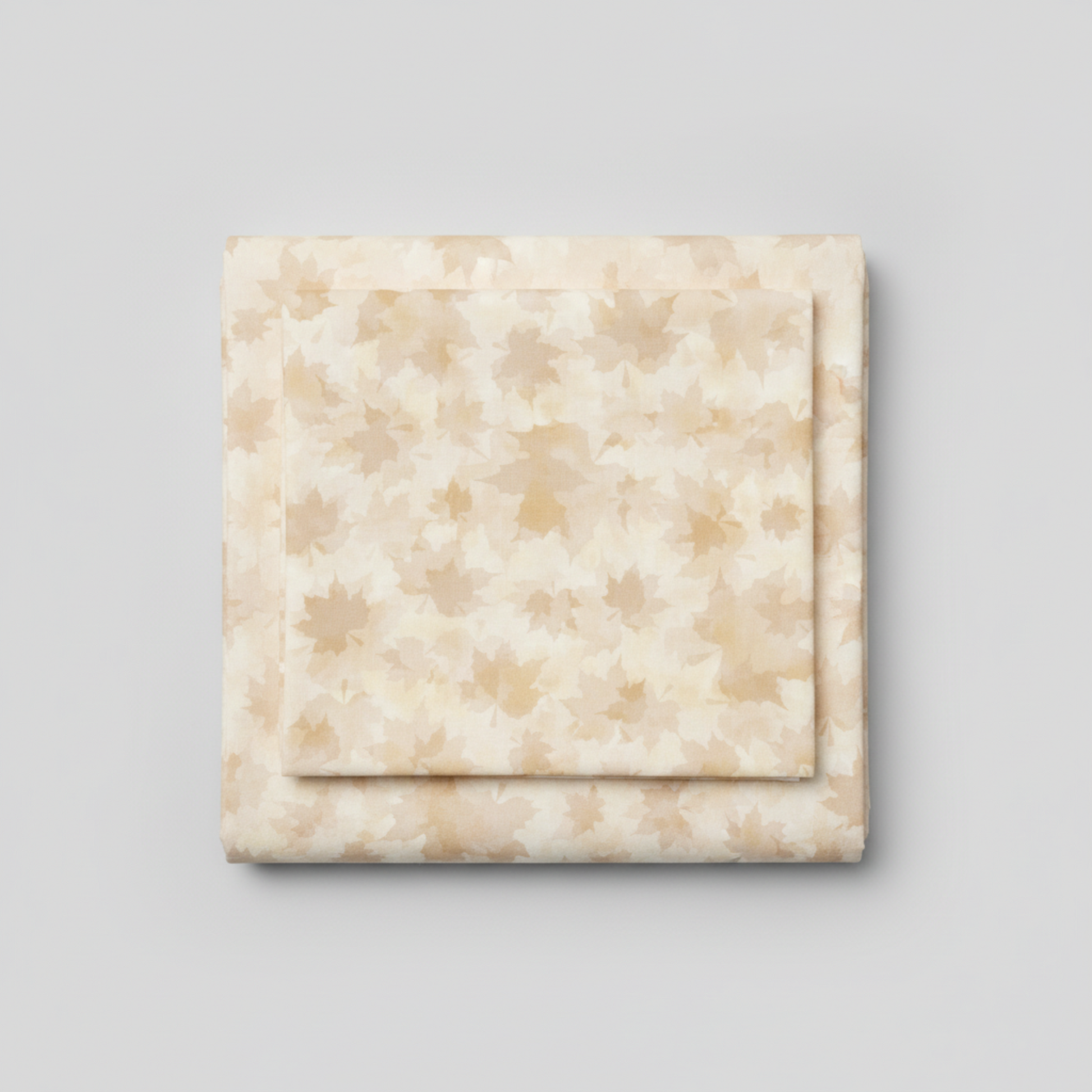 Close-up of Reflections of Autumn II Shadow Maple Leaf Cream quilting cotton showing delicate leaf silhouettes