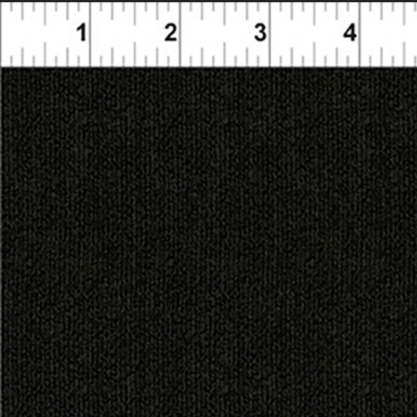 Texture Graphix Speckle Black quilting cotton with ruler showing scale of speckle pattern repeat