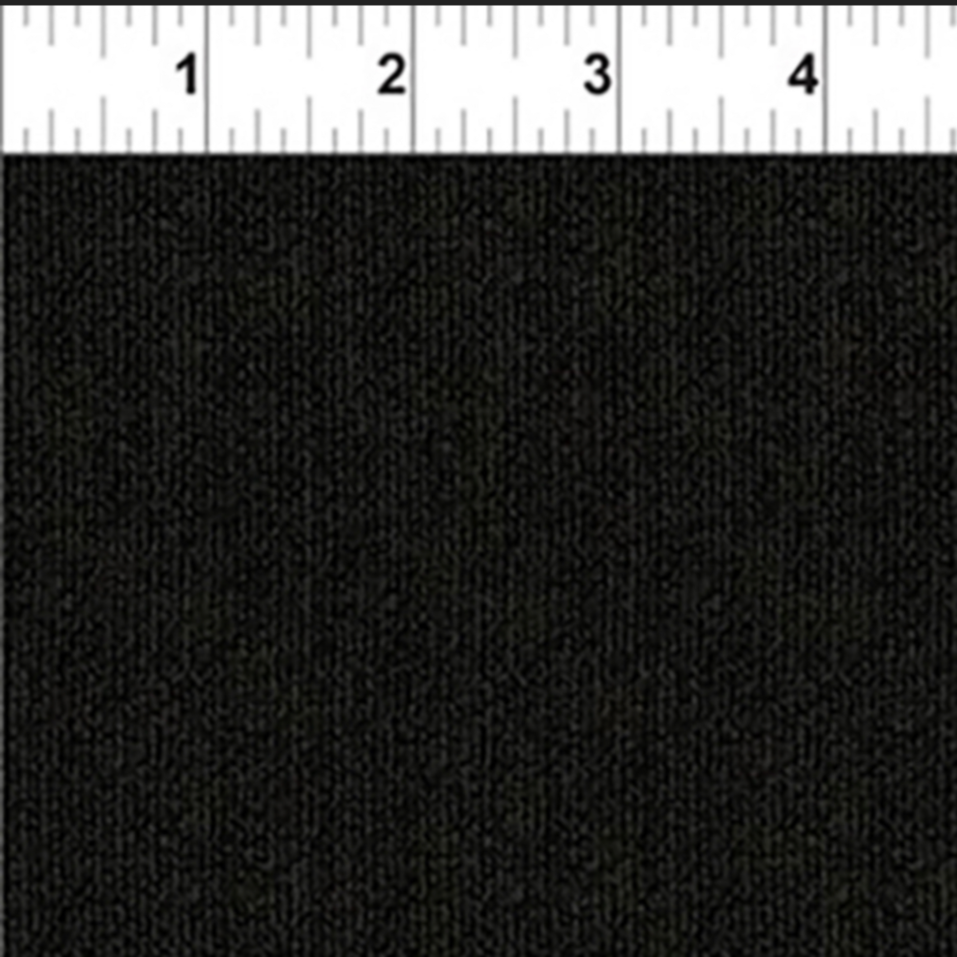 Texture Graphix Speckle Black quilting cotton with ruler showing scale of speckle pattern repeat