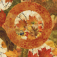 Close-up detail of Autumn Celebration Multi Circles fabric showing intricate medallion pattern and rich autumn colors