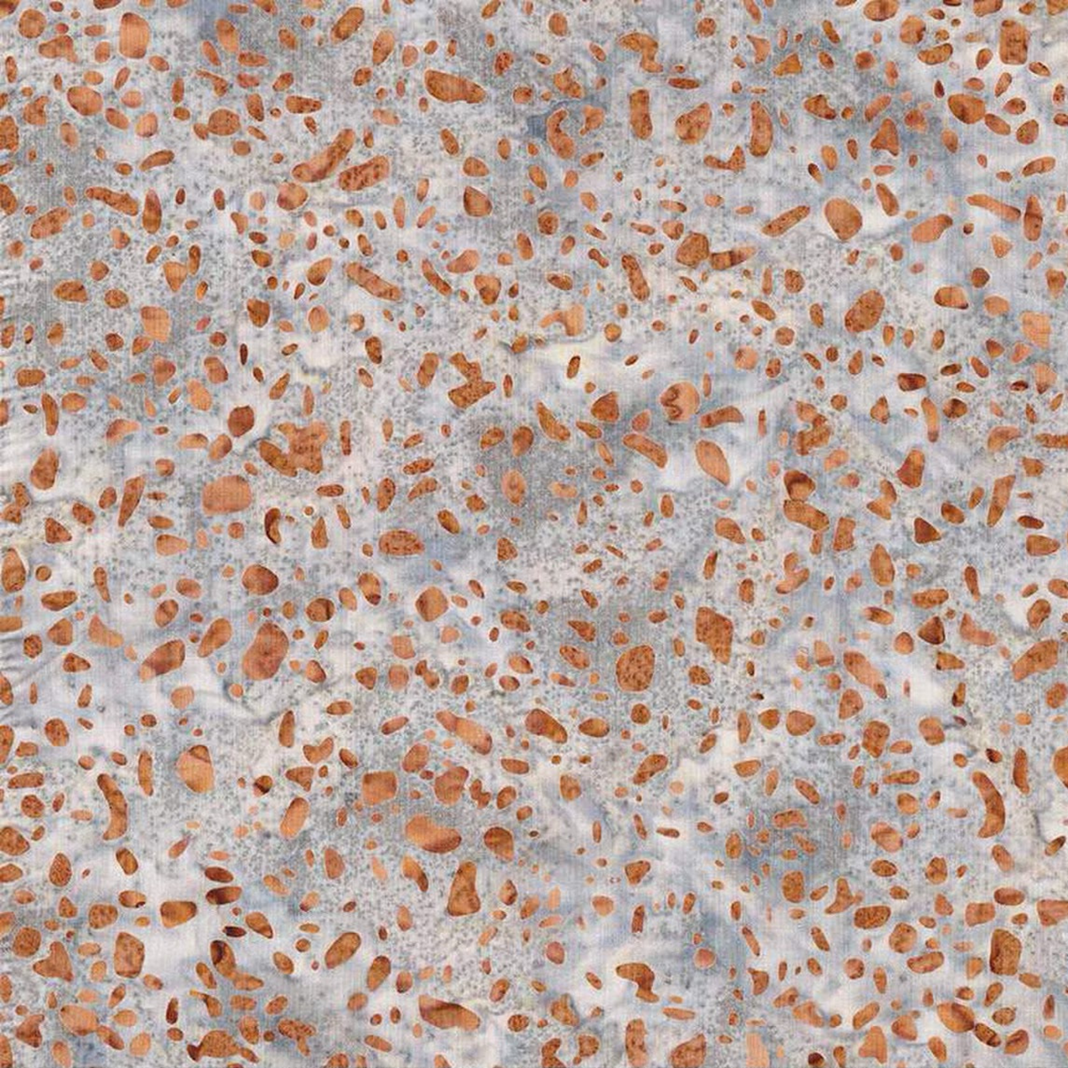 Terrazzo Coastal Path Fabric by Riley Blake Designs, featuring peach and copper pebble-shaped flecks on a mottled light-gray and cream background