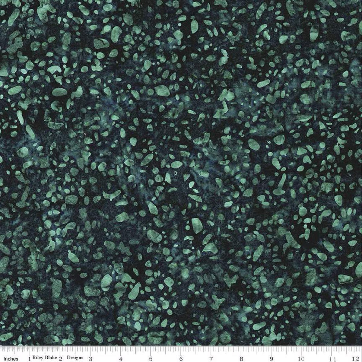 Terrazzo Smoky Teal fabric by Riley Blake Designs — soft teal terrazzo speckles on a dark navy-teal hand-dyed batik, shown with a ruler for scale.
