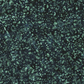 Close-up of Terrazzo Smoky Teal batik fabric by Riley Blake Designs, showing irregular soft teal speckles and mottled texture on a dark navy-teal ground.