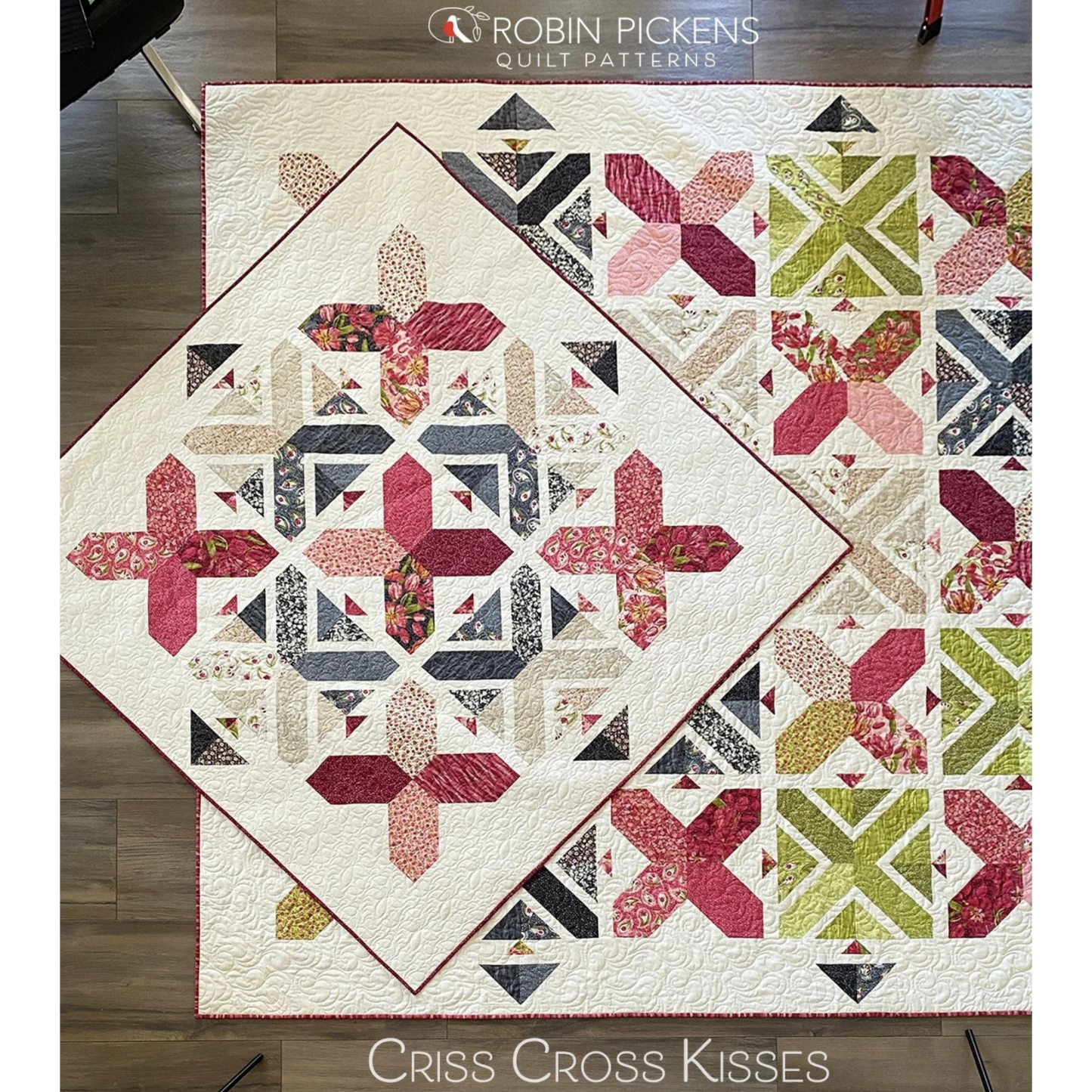Criss Cross Kisses quilt pattern overhead flat lay by Robin Pickens — crimson and navy colorway alongside green and pink colorway, showing X blocks and arrowhead sashing on cream background
