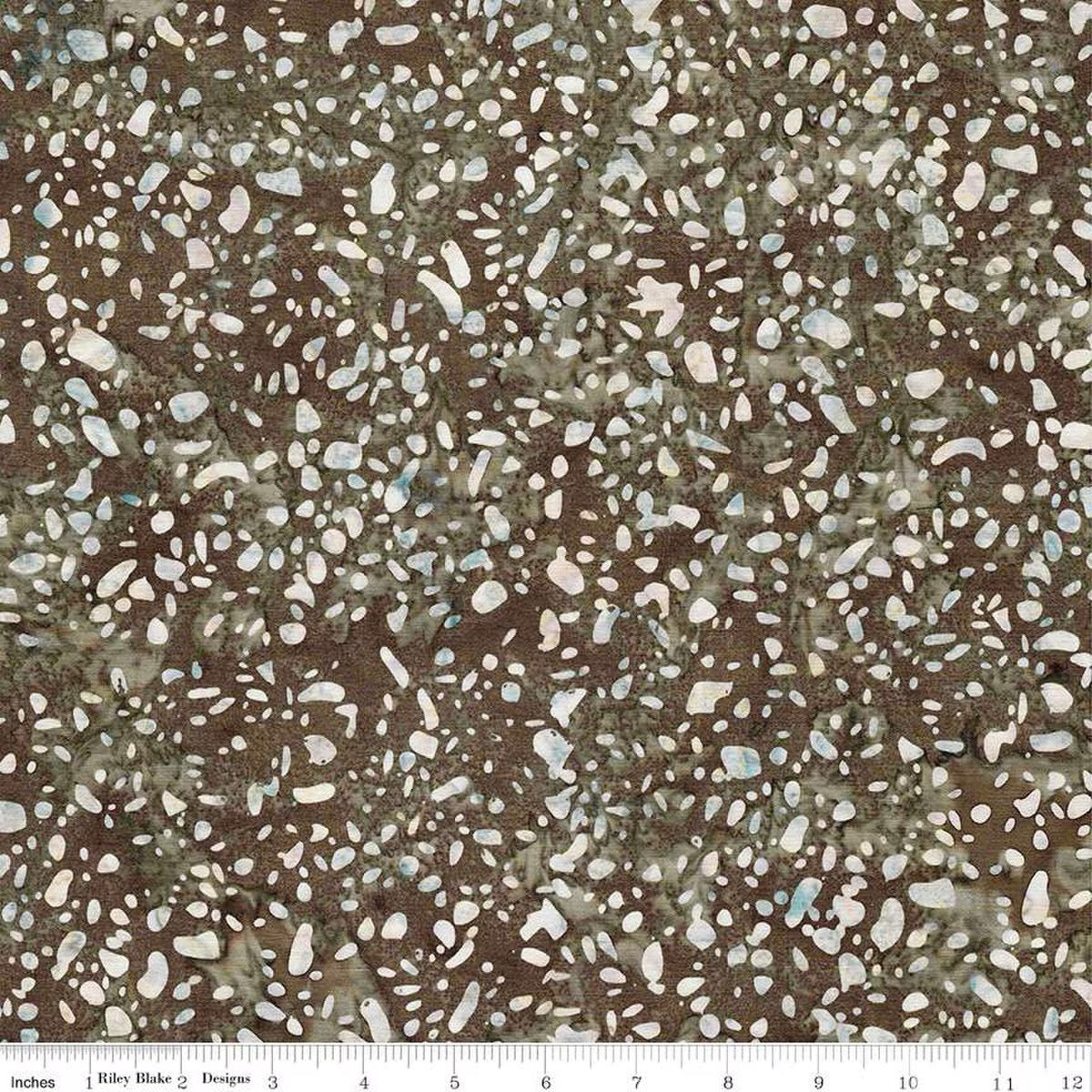 Terrazzo Khaki fabric by Riley Blake Designs — cream and pale-blue terrazzo speckles on a warm brown hand-dyed batik, shown with a ruler for scale.