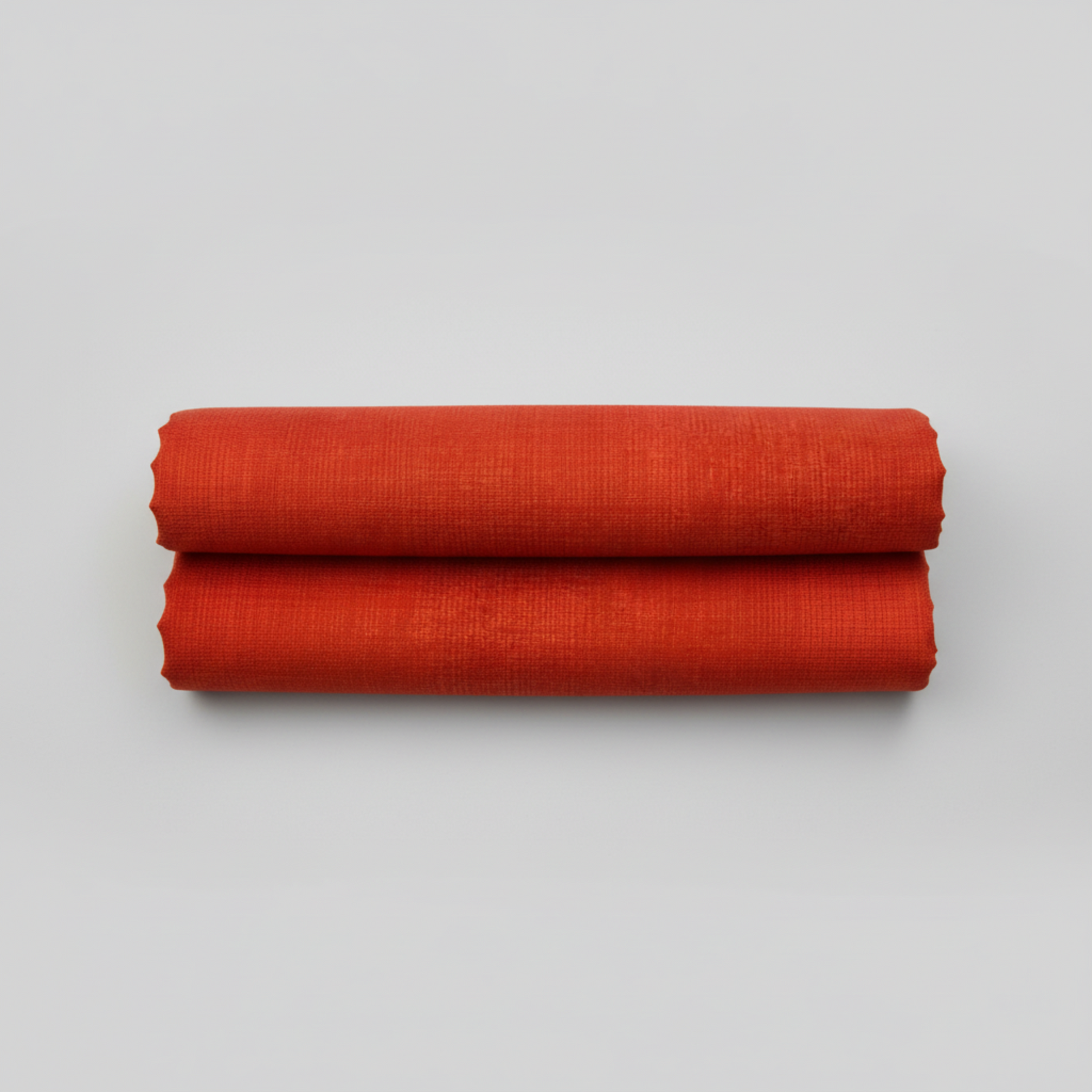 Interwoven Tomato quilting cotton fabric by Jason Yenter showing vibrant tomato red geometric woven pattern