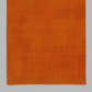 Interwoven Pumpkin quilting cotton showing fabric texture and geometric pattern detail