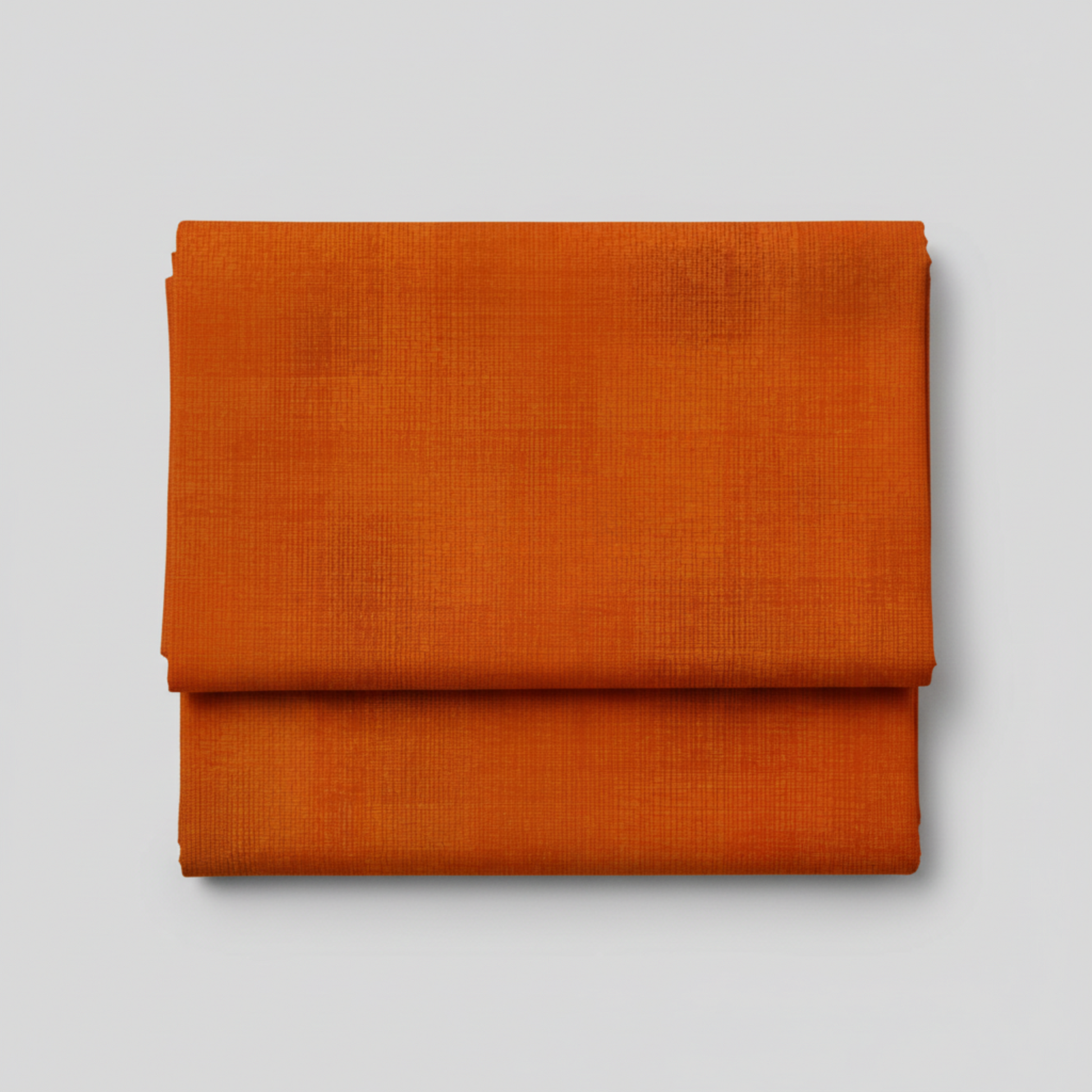 Interwoven Pumpkin quilting cotton fabric by Jason Yenter showing warm pumpkin orange geometric woven pattern
