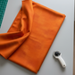 Interwoven Pumpkin quilting cotton lifestyle photo showing fabric detail and texture