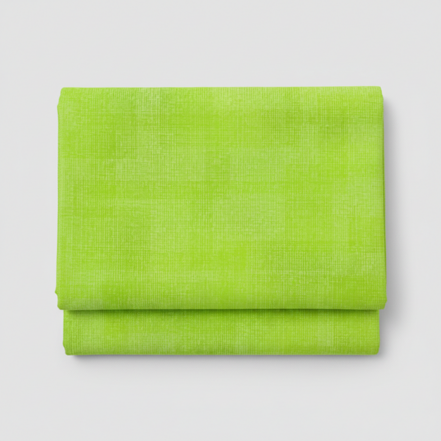Interwoven Lime quilting cotton showing fabric texture and geometric pattern detail