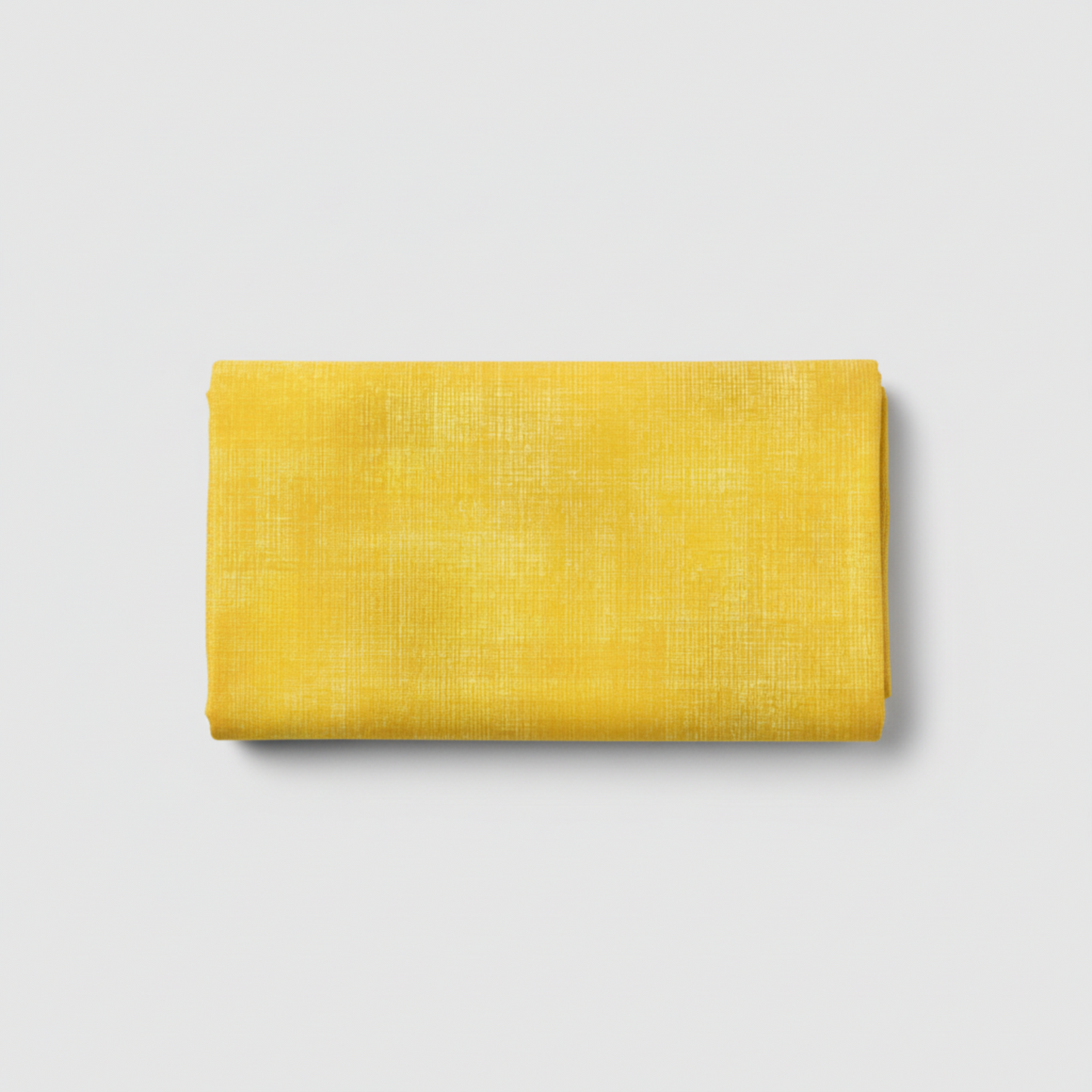 Interwoven Yellow quilting cotton showing fabric texture and geometric pattern detail