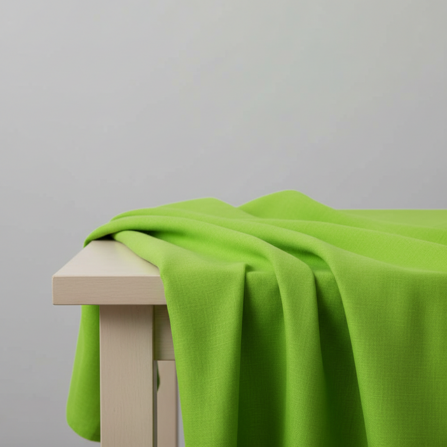 Interwoven Spring Grass quilting cotton fabric by Jason Yenter showing fresh spring grass green geometric woven pattern
