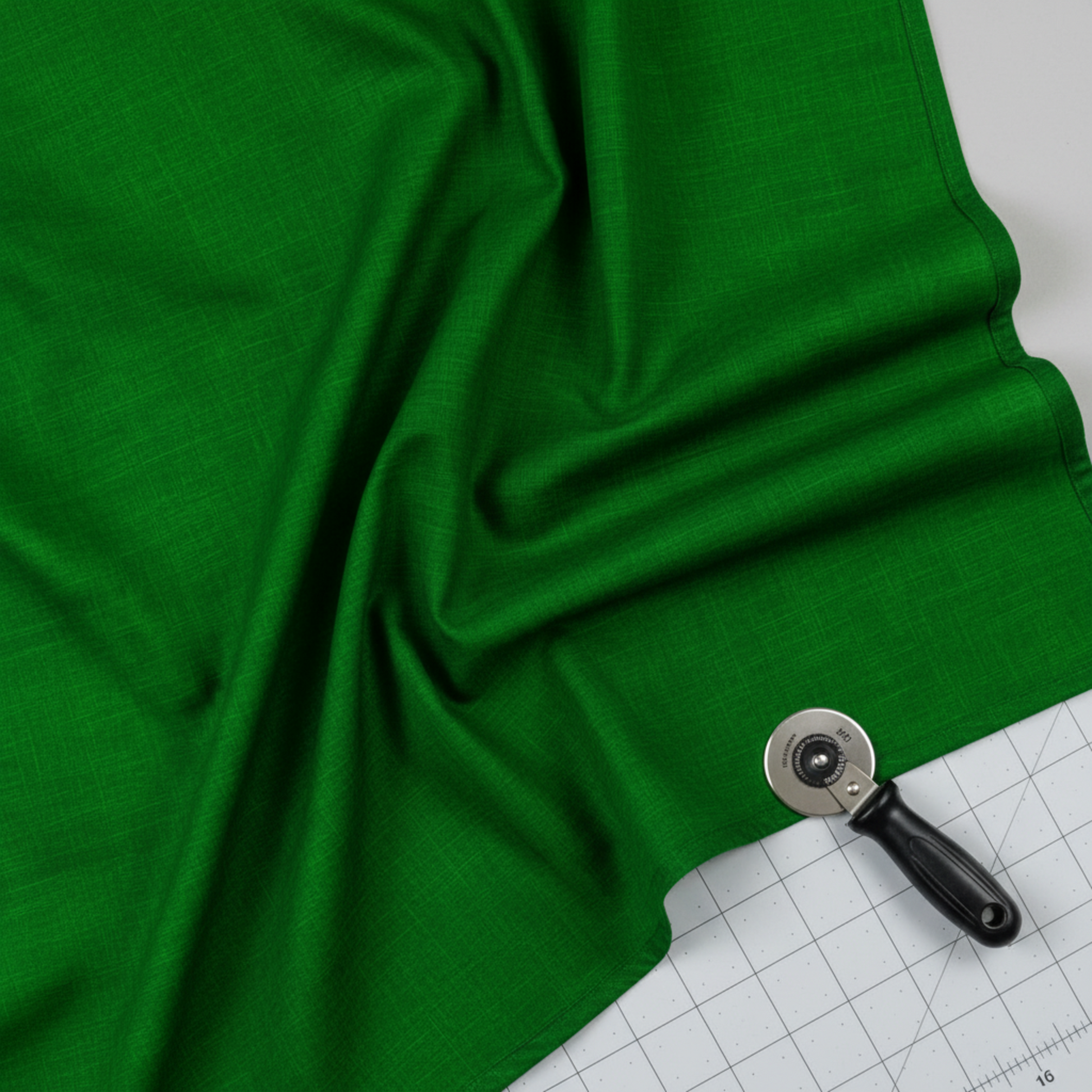 Interwoven Dark Green quilting cotton fabric by Jason Yenter showing rich dark green geometric woven pattern