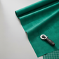 Interwoven Blue Green quilting cotton fabric by Jason Yenter showing cool blue-green teal geometric woven pattern