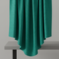 Interwoven Blue Green quilting cotton showing fabric body and drape quality