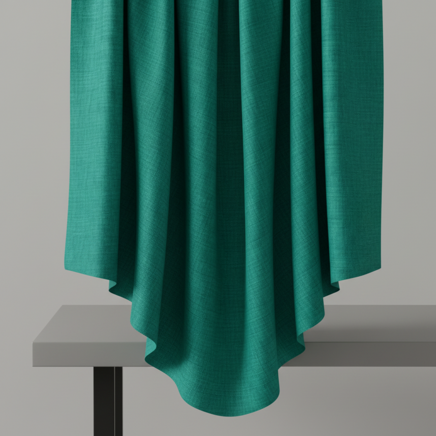 Interwoven Blue Green quilting cotton showing fabric body and drape quality