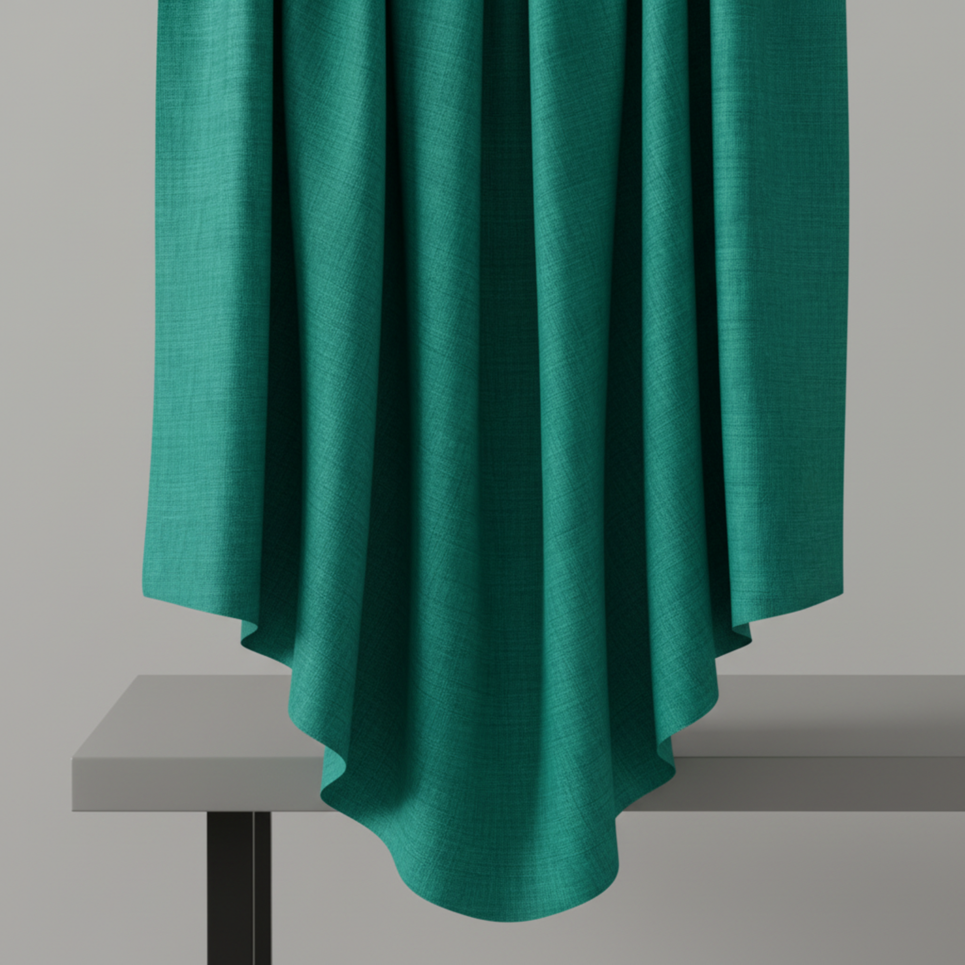 Interwoven Blue Green quilting cotton showing fabric body and drape quality